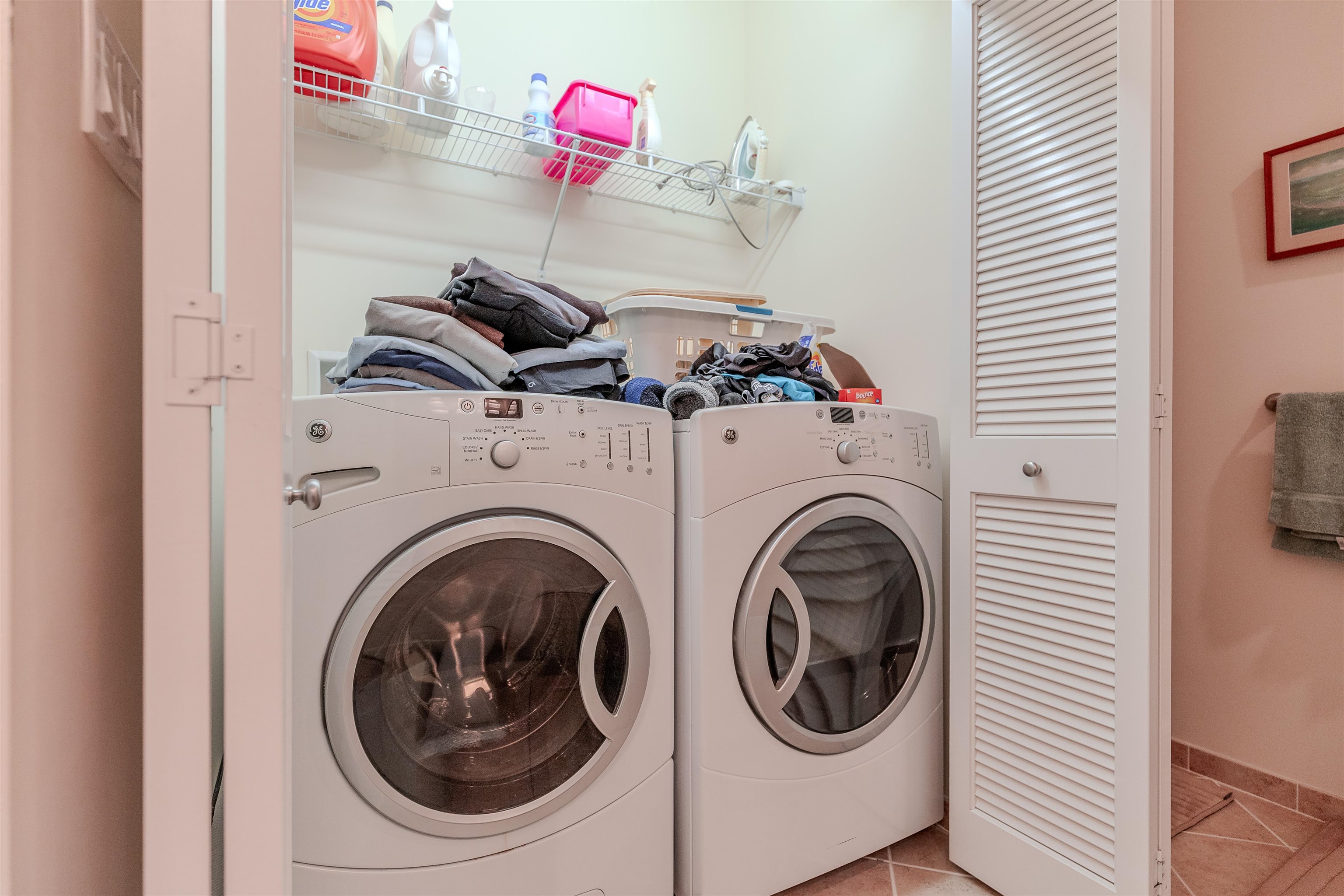 902 Ocean, Unit 106 Cape May, NJ 08204 - Photo 29 of 33 a utility room with dryer and washer