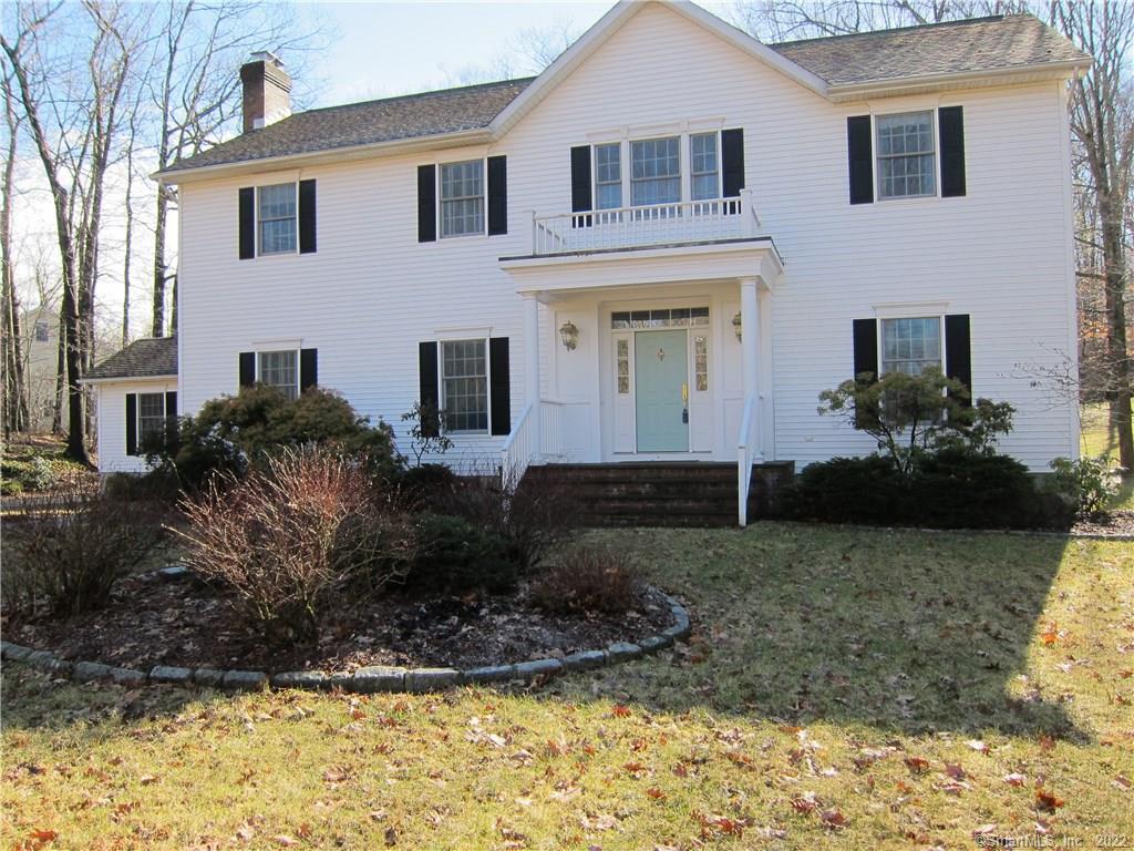 136 Ivy Hill Road Ridgefield, CT 06877 - Photo 1 of 1 a front view of a house with garden