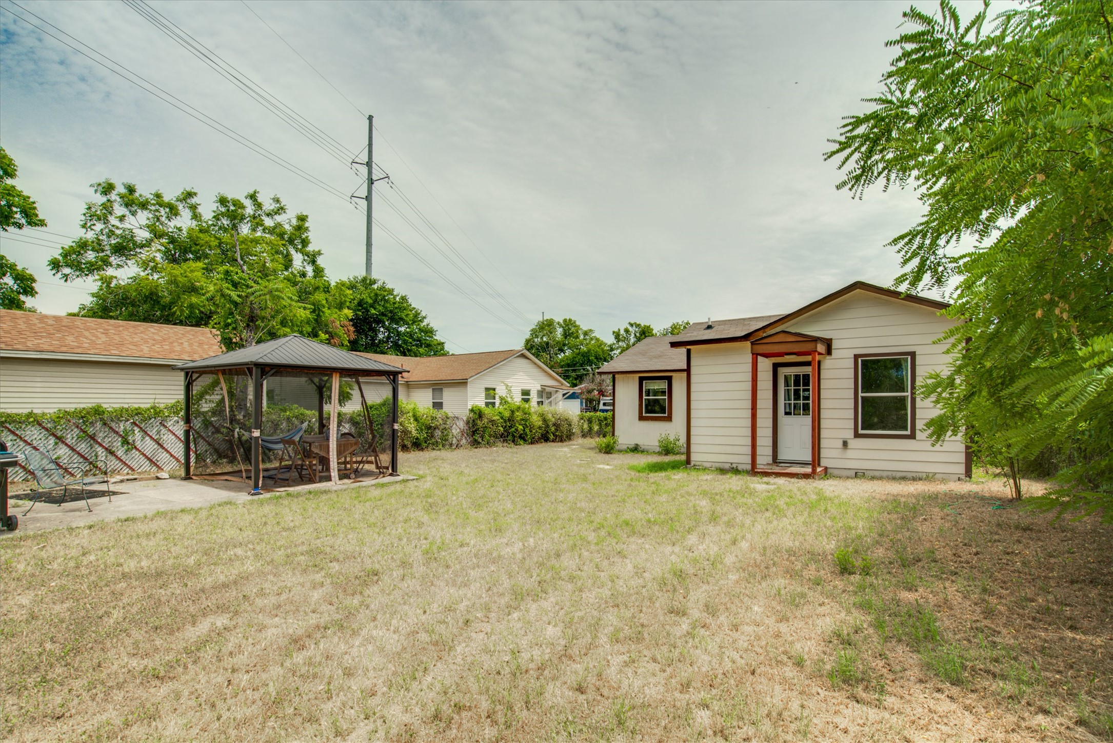 4615 Ribbecke Avenue Austin, TX 78721 - Photo 16 of 19 View of grassy yard featuring a gazebo and a patio area
