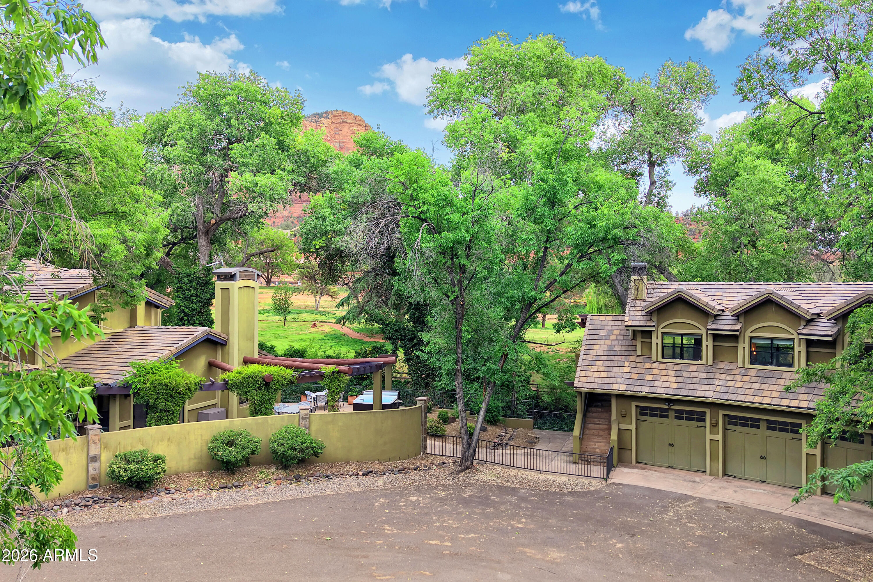 55 Ranch House Circle Sedona, AZ 86336 - Photo 2 of 61 a view of house with outdoor space and sitting area