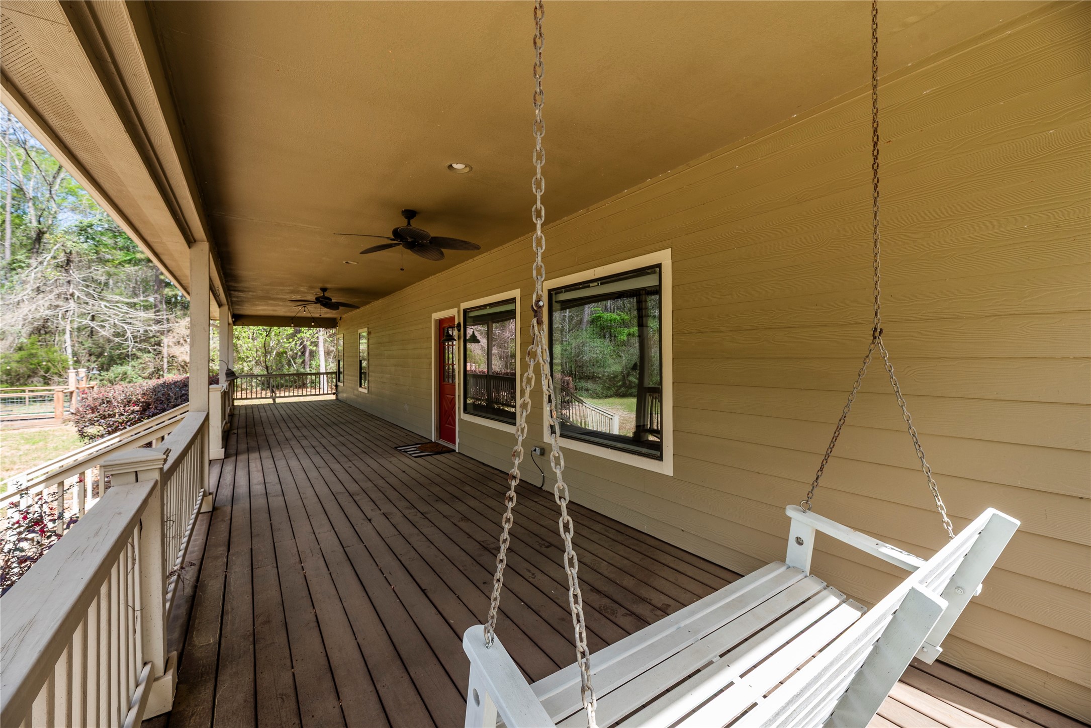 12062 Ike White Road Conroe, TX 77303 - Photo 9 of 37 Expansive front porch.