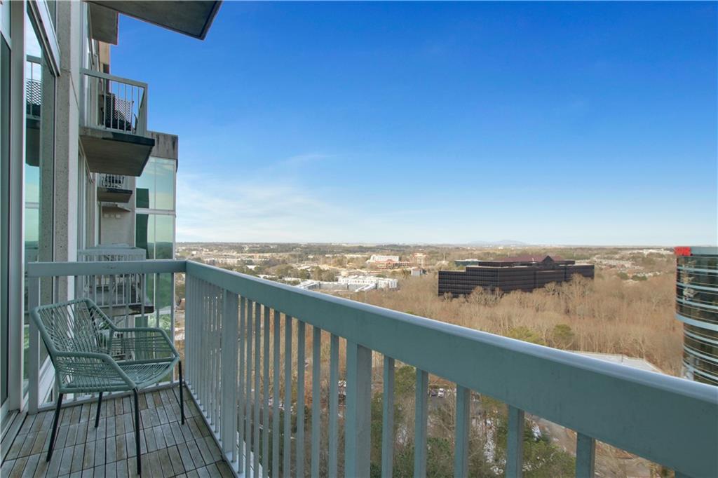 3300 Windy Ridge Parkway Southeast, Unit 1603 Atlanta, GA 30339 - Photo 23 of 39 a view of a balcony next to a lake view