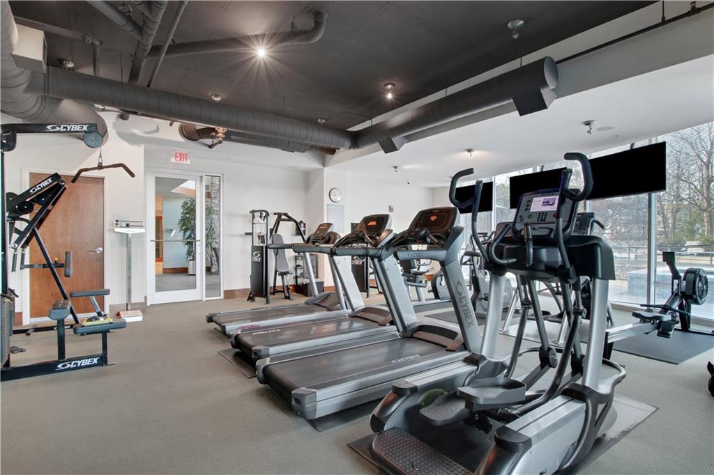 3300 Windy Ridge Parkway Southeast, Unit 1603 Atlanta, GA 30339 - Photo 32 of 39 a view of a room with gym equipment