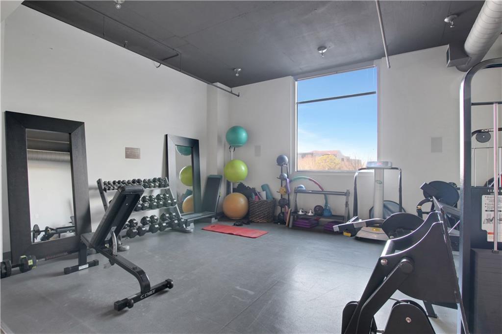 3300 Windy Ridge Parkway Southeast, Unit 1603 Atlanta, GA 30339 - Photo 33 of 39 a room with gym equipment