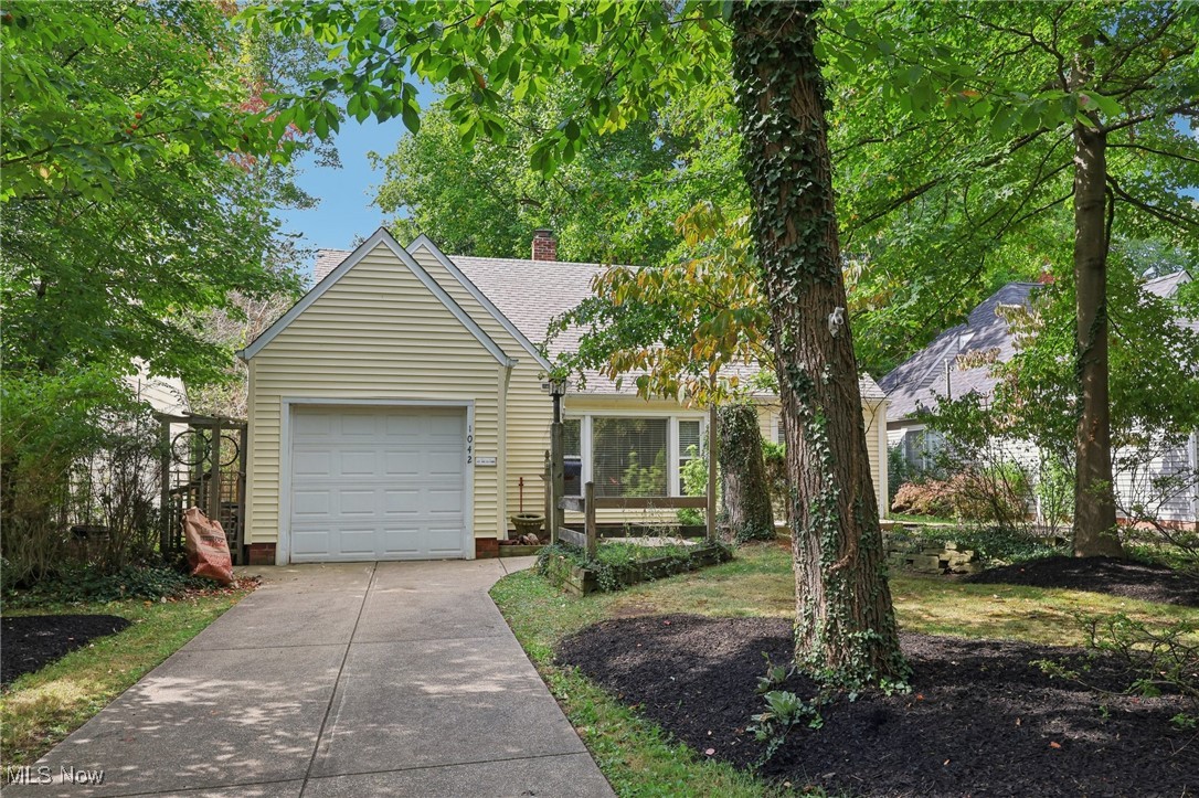 View of front of home featuring a garage