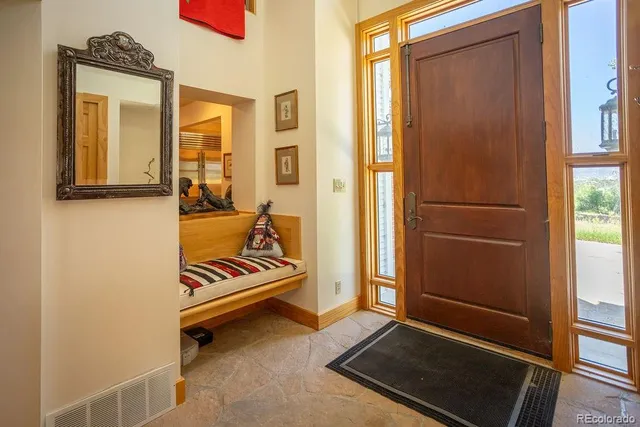 a view of room with furniture and windows