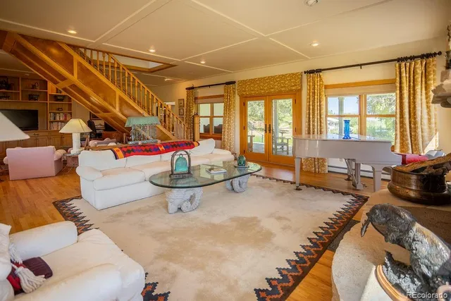 a very nice looking living room with a large window