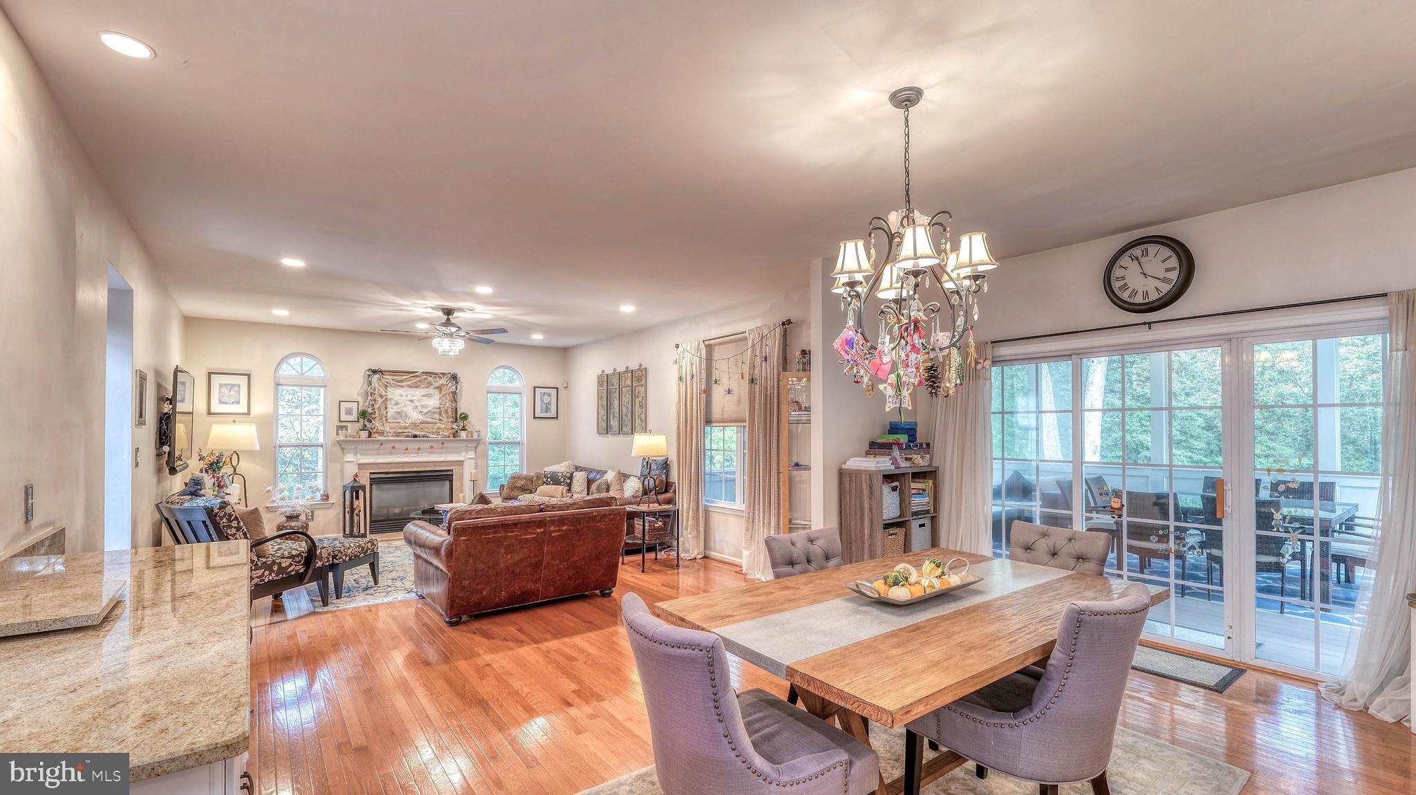 107 Millstone Way Monroeville, NJ 08343 - Photo 15 of 40 a view of a dining room with furniture large windows and wooden floor
