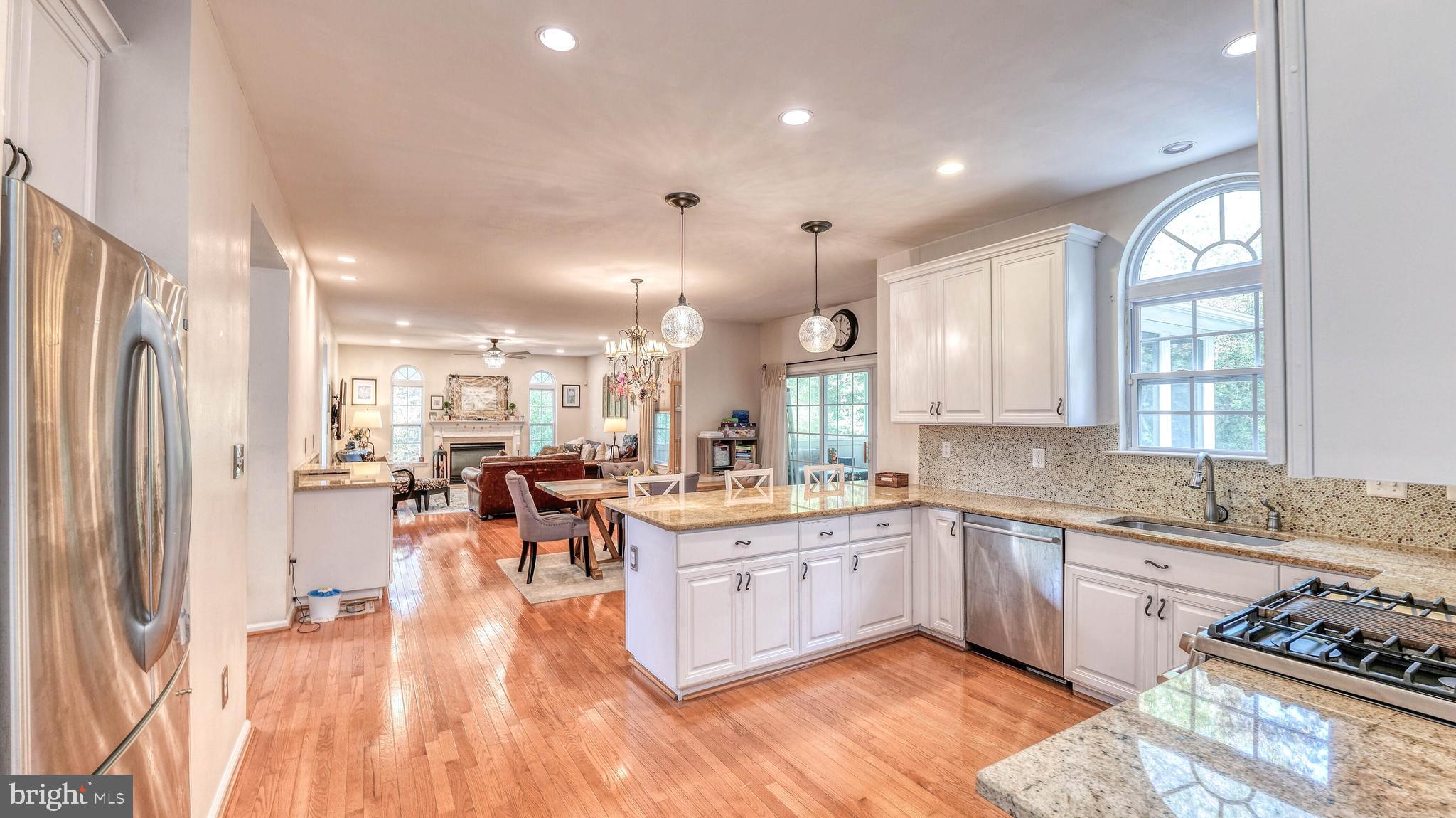 107 Millstone Way Monroeville, NJ 08343 - Photo 18 of 40 a large kitchen with lots of counter and cabinets