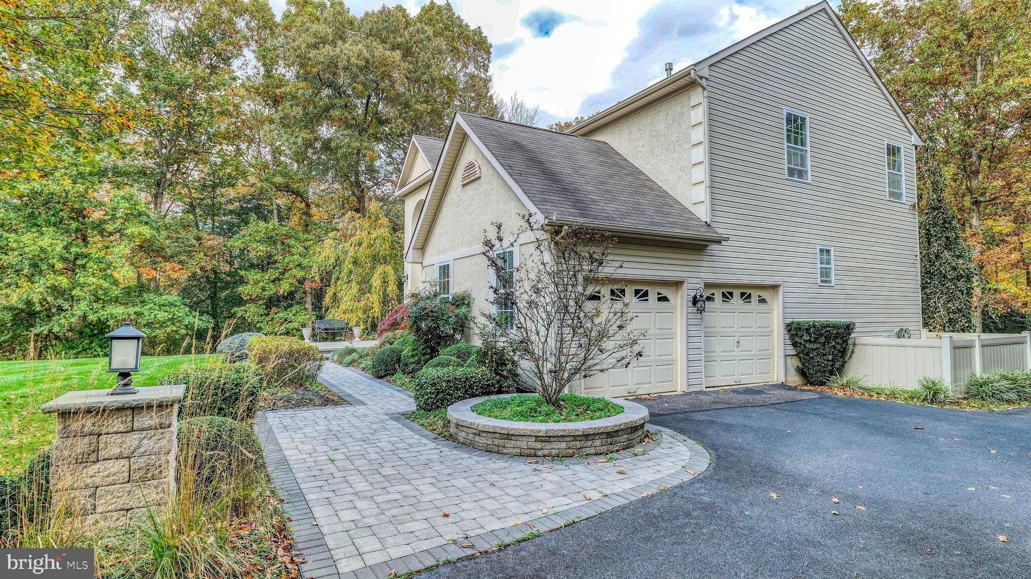 107 Millstone Way Monroeville, NJ 08343 - Photo 3 of 40 a view of a house with backyard and garden