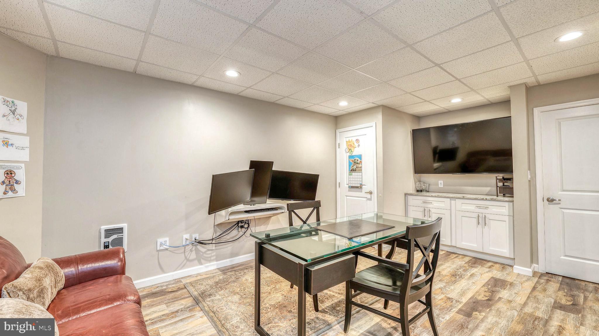 107 Millstone Way Monroeville, NJ 08343 - Photo 34 of 40 a view of a livingroom with furniture and a flat screen tv