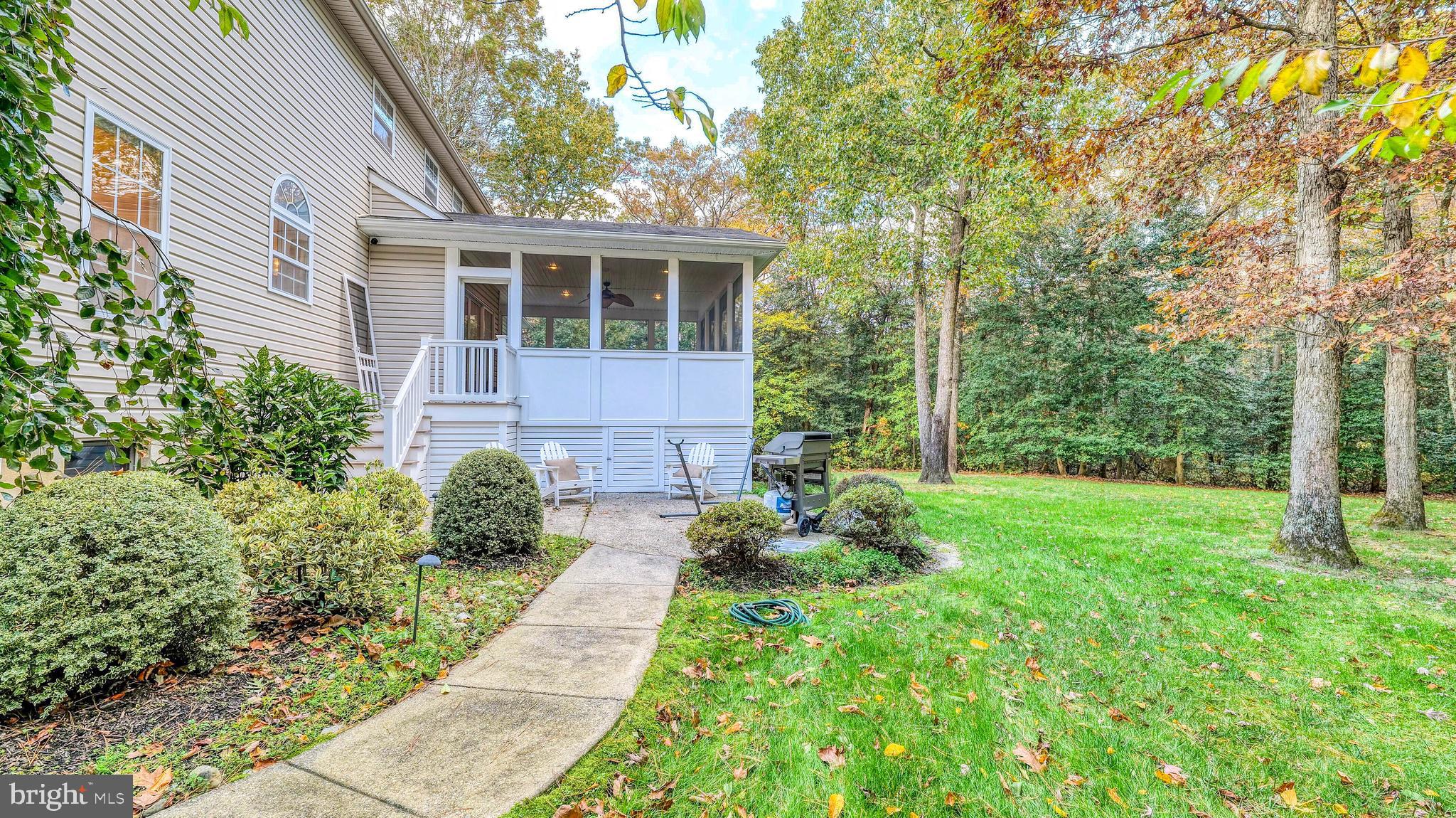 107 Millstone Way Monroeville, NJ 08343 - Photo 38 of 40 a view of an house with backyard space and garden