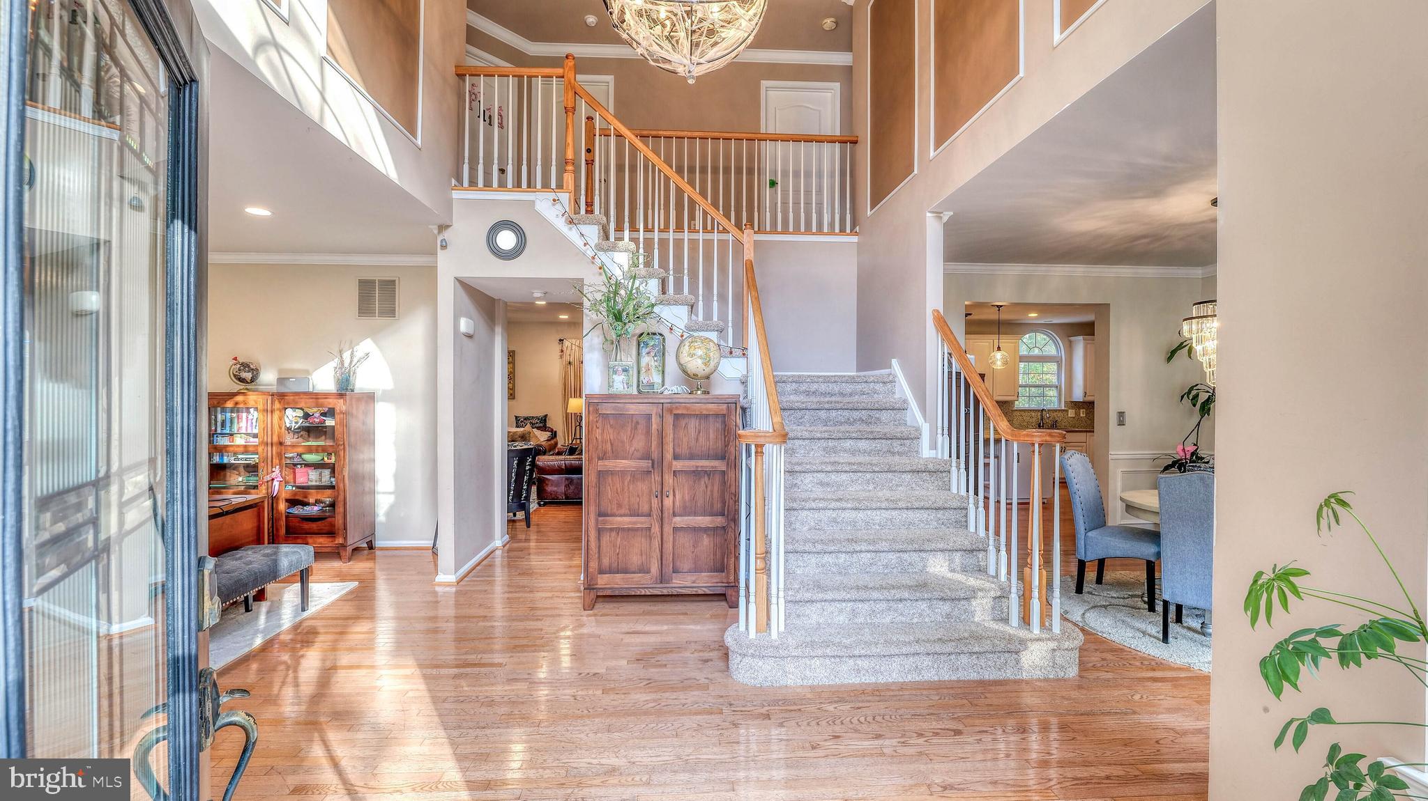 107 Millstone Way Monroeville, NJ 08343 - Photo 6 of 40 a view of entryway and hall with wooden floor