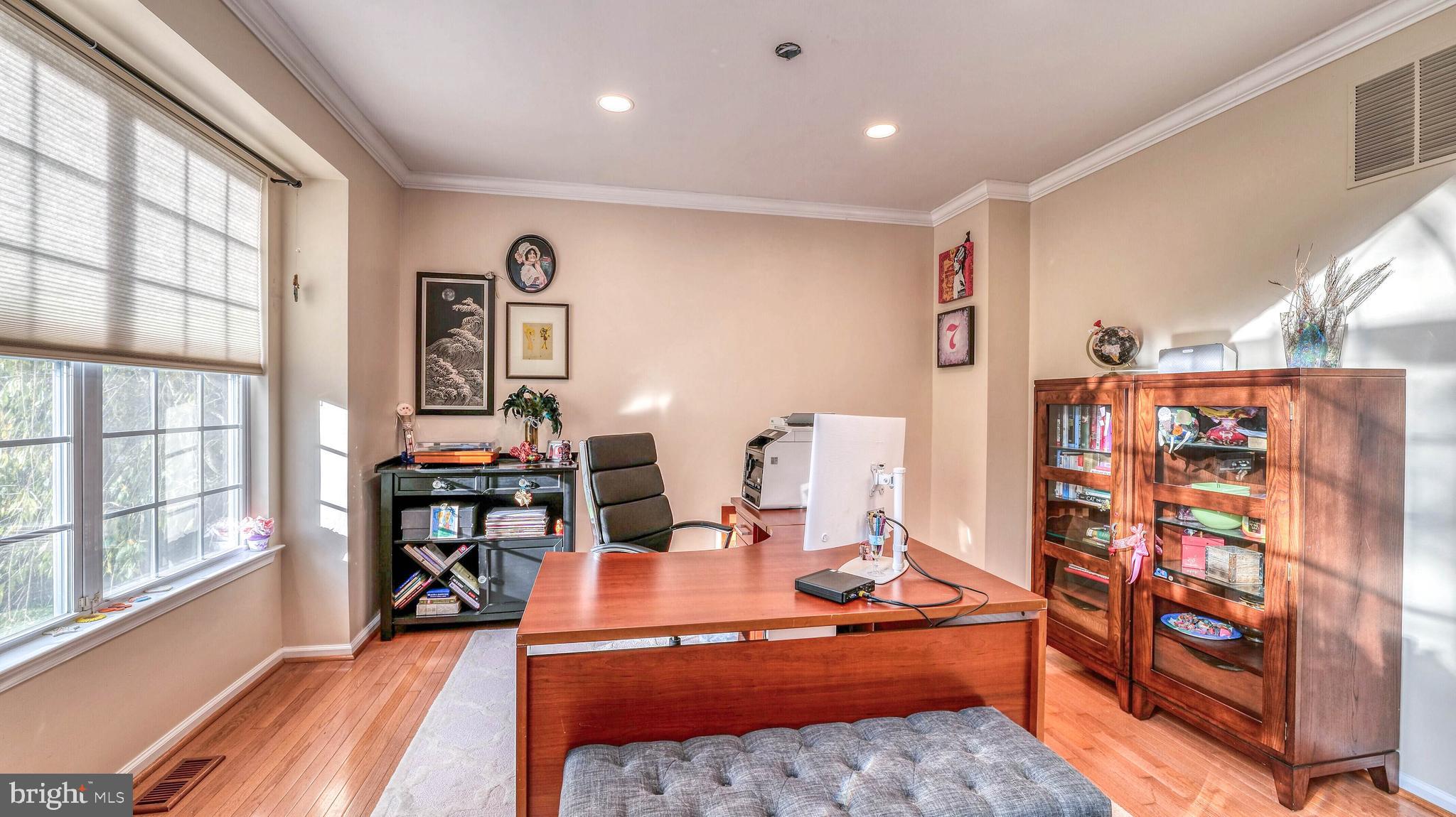 107 Millstone Way Monroeville, NJ 08343 - Photo 9 of 40 a living room with furniture a rug and a large window