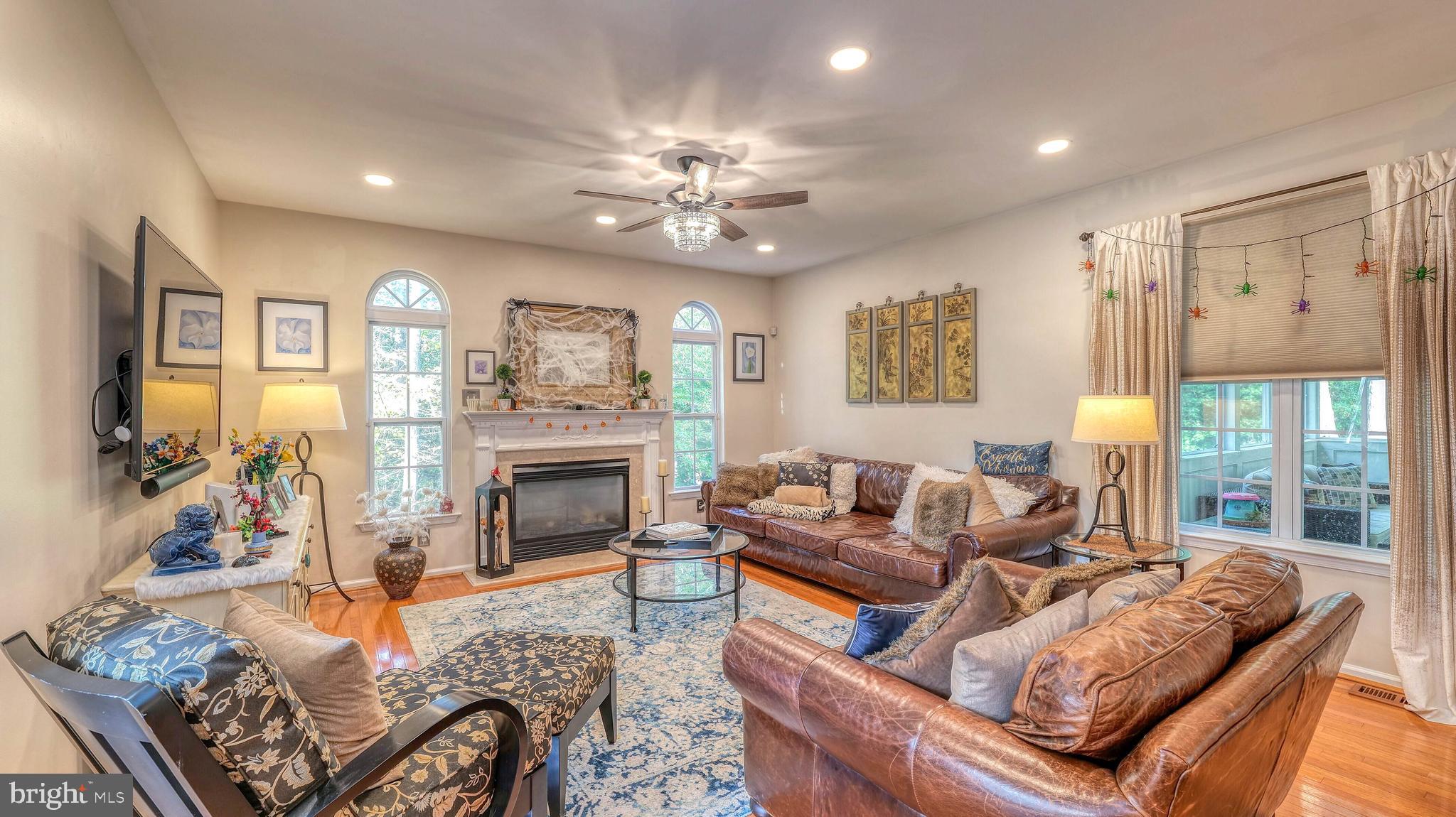 107 Millstone Way Monroeville, NJ 08343 - Photo 10 of 40 a living room with furniture and a fireplace