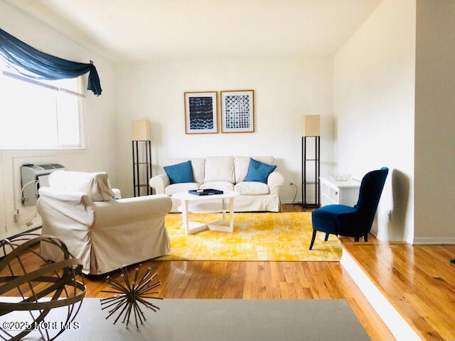 35 Sternberger Avenue, Unit K Long Branch, NJ 07740 - Photo 2 of 6 a living room with furniture and a lamp