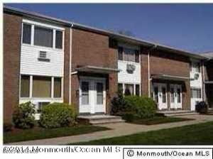 35 Sternberger Avenue, Unit K Long Branch, NJ 07740 - Photo 3 of 6 a front view of a house with a yard