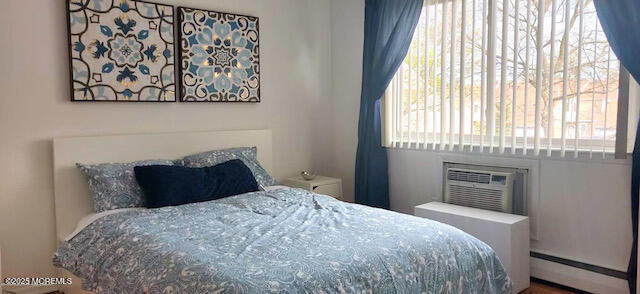 35 Sternberger Avenue, Unit K Long Branch, NJ 07740 - Photo 6 of 6 a bedroom with a bed and a window