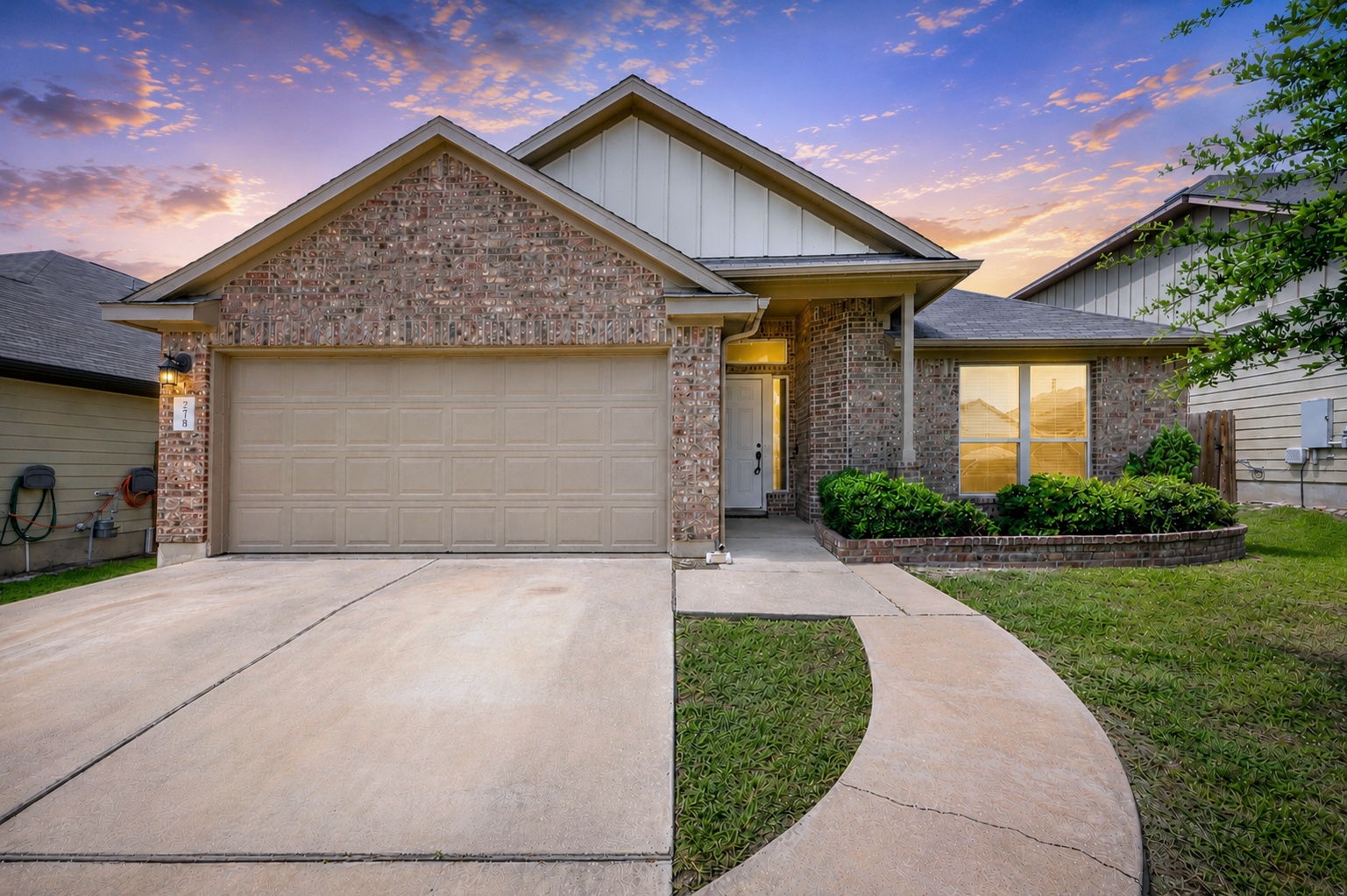 278 Noddy Road Buda, TX 78610 - Photo 1 of 17 A classic brick exterior with a welcoming entryway and well-maintained landscaping.