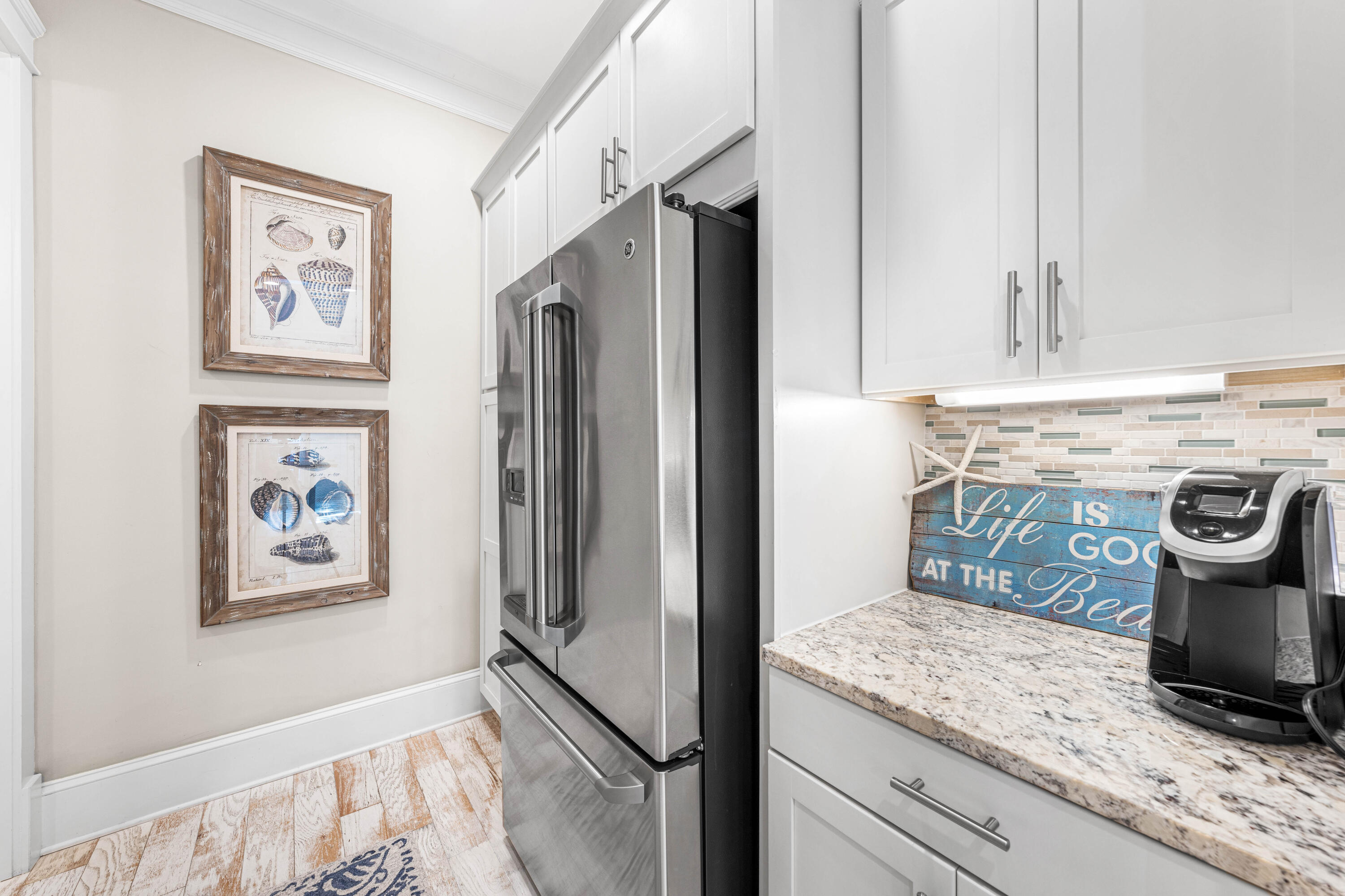 27 Federal Street Inlet Beach, FL 32461 - Photo 19 of 74 a kitchen with stainless steel appliances granite countertop a refrigerator and a stove