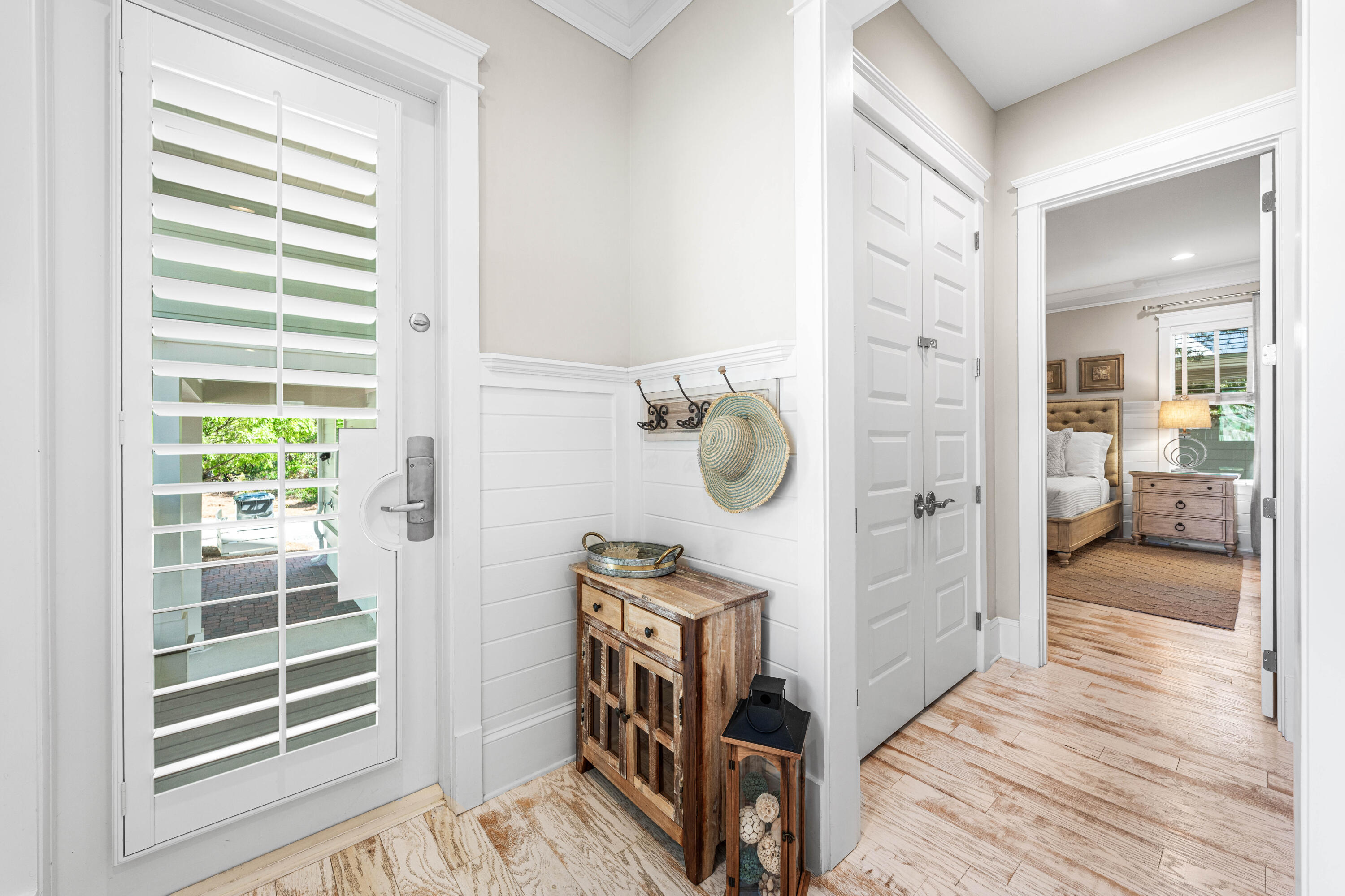 27 Federal Street Inlet Beach, FL 32461 - Photo 26 of 74 a view of a hallway and a livingroom with wooden floor