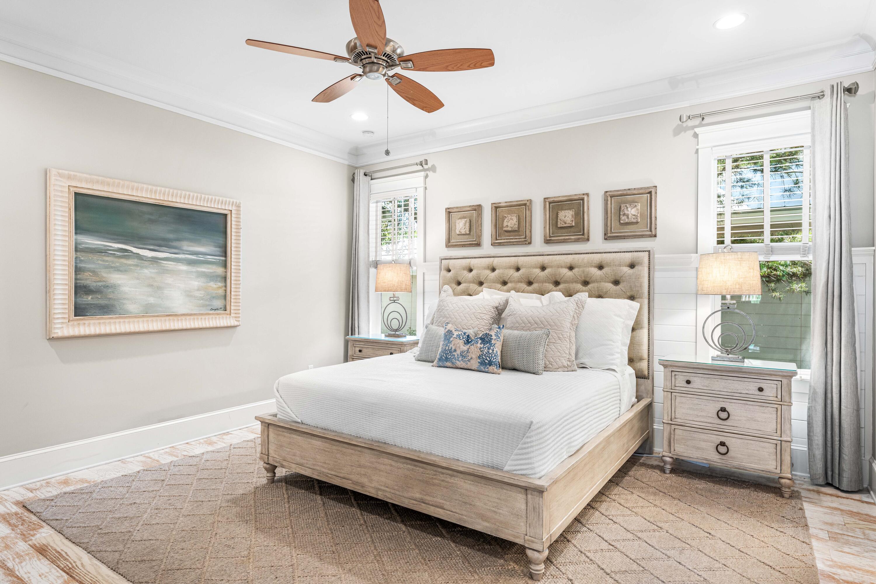 27 Federal Street Inlet Beach, FL 32461 - Photo 28 of 74 a bedroom with a large bed and a window