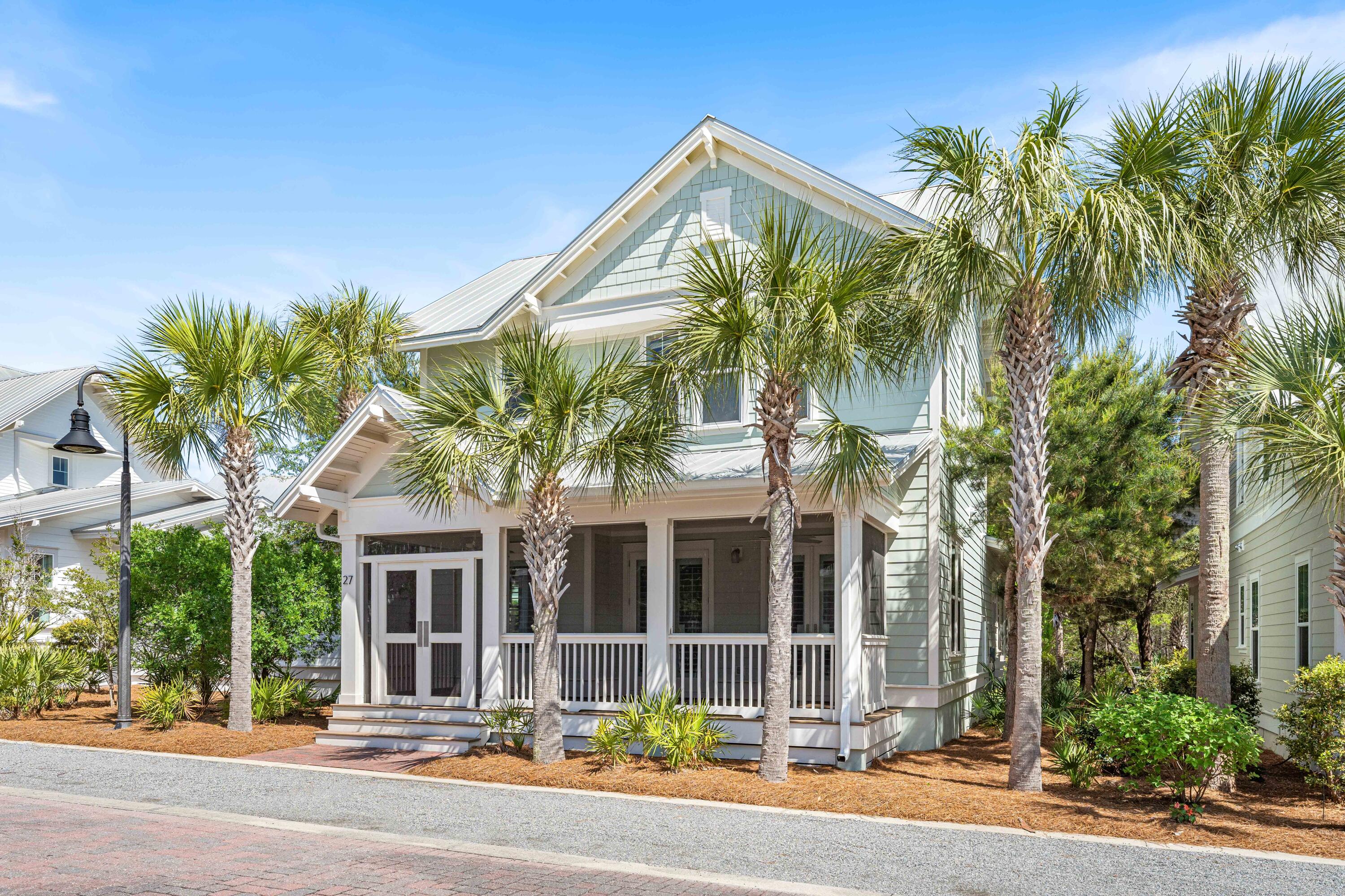 27 Federal Street Inlet Beach, FL 32461 - Photo 3 of 74 front view of a building with a garden