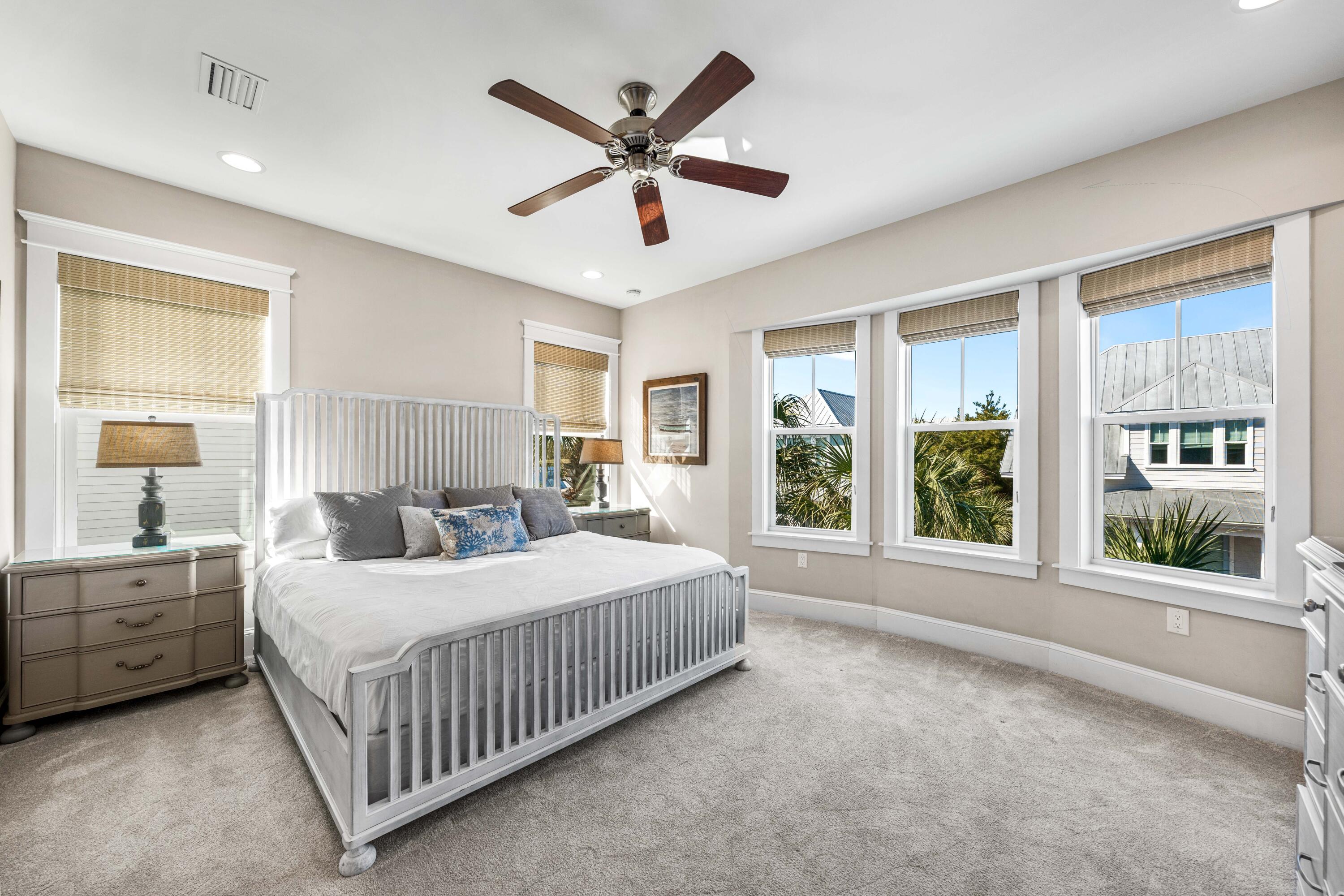 27 Federal Street Inlet Beach, FL 32461 - Photo 41 of 74 a bedroom with a large bed and windows