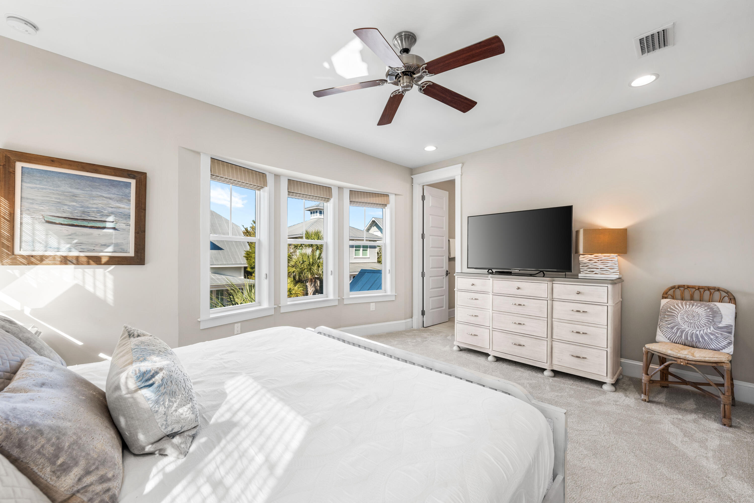 27 Federal Street Inlet Beach, FL 32461 - Photo 42 of 74 a bedroom with a bed flat screen tv and a window
