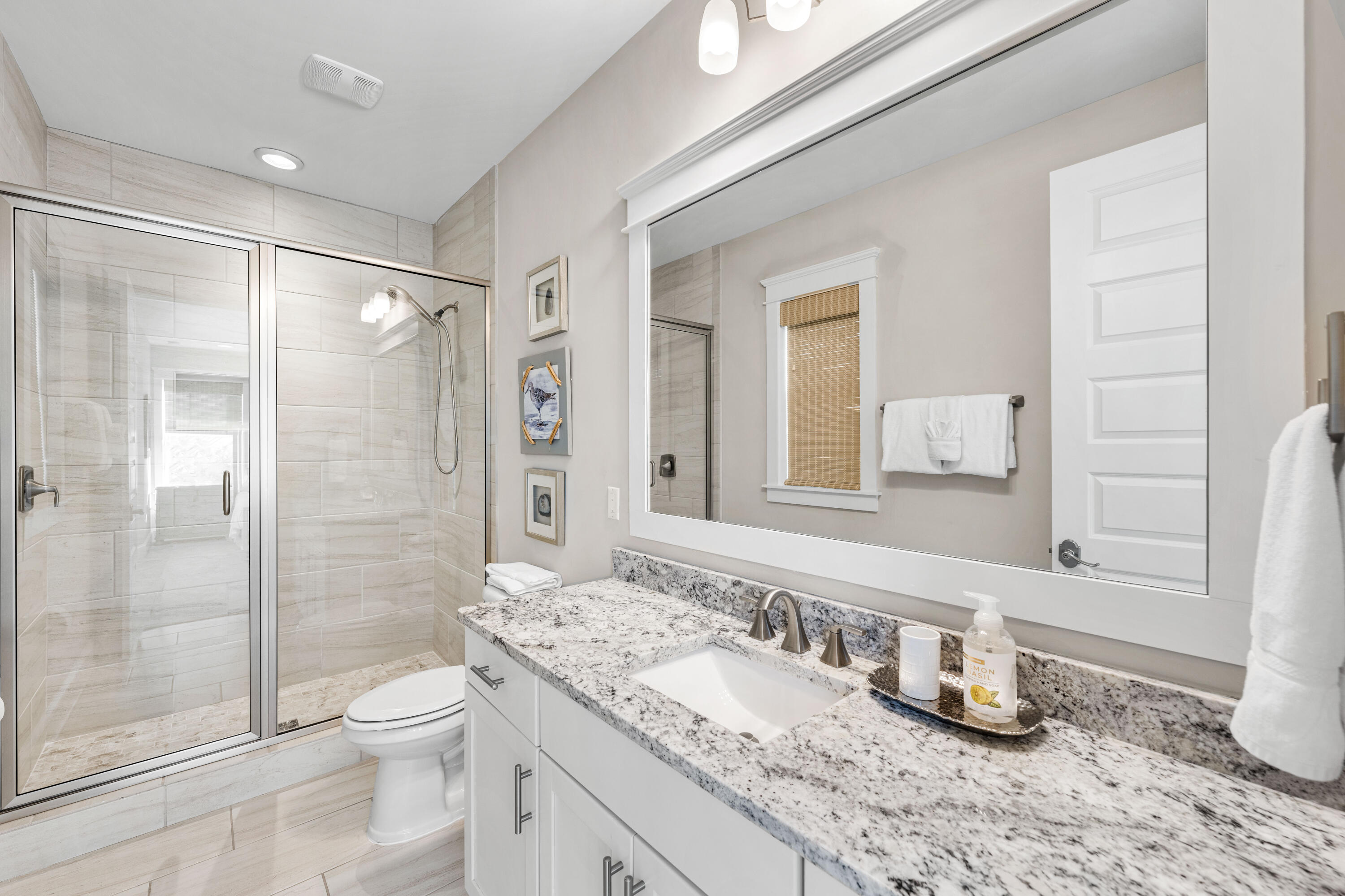 27 Federal Street Inlet Beach, FL 32461 - Photo 44 of 74 a bathroom with a granite countertop sink a toilet and shower