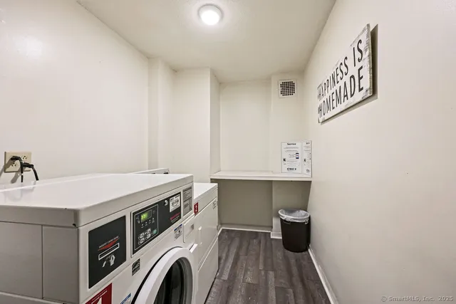 a view of a patio with a table chairs and backyard