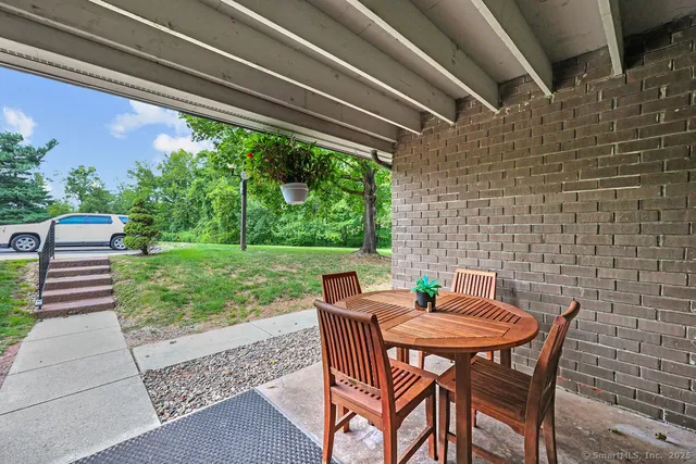 a view of house with yard