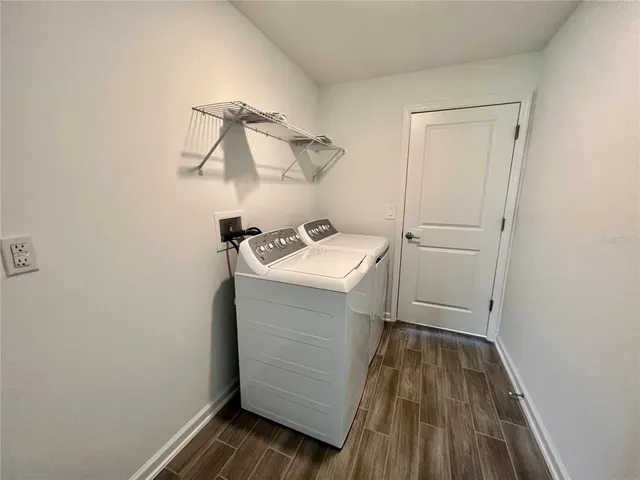 a utility room with dryer and washer
