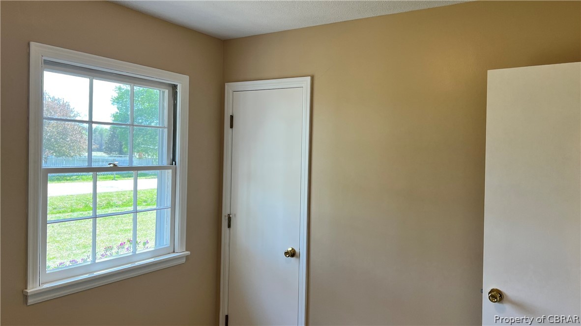8121 Glass Road Hayes, VA 23072 - Photo 14 of 23 1st Bedroom-Wood Floor under carpet