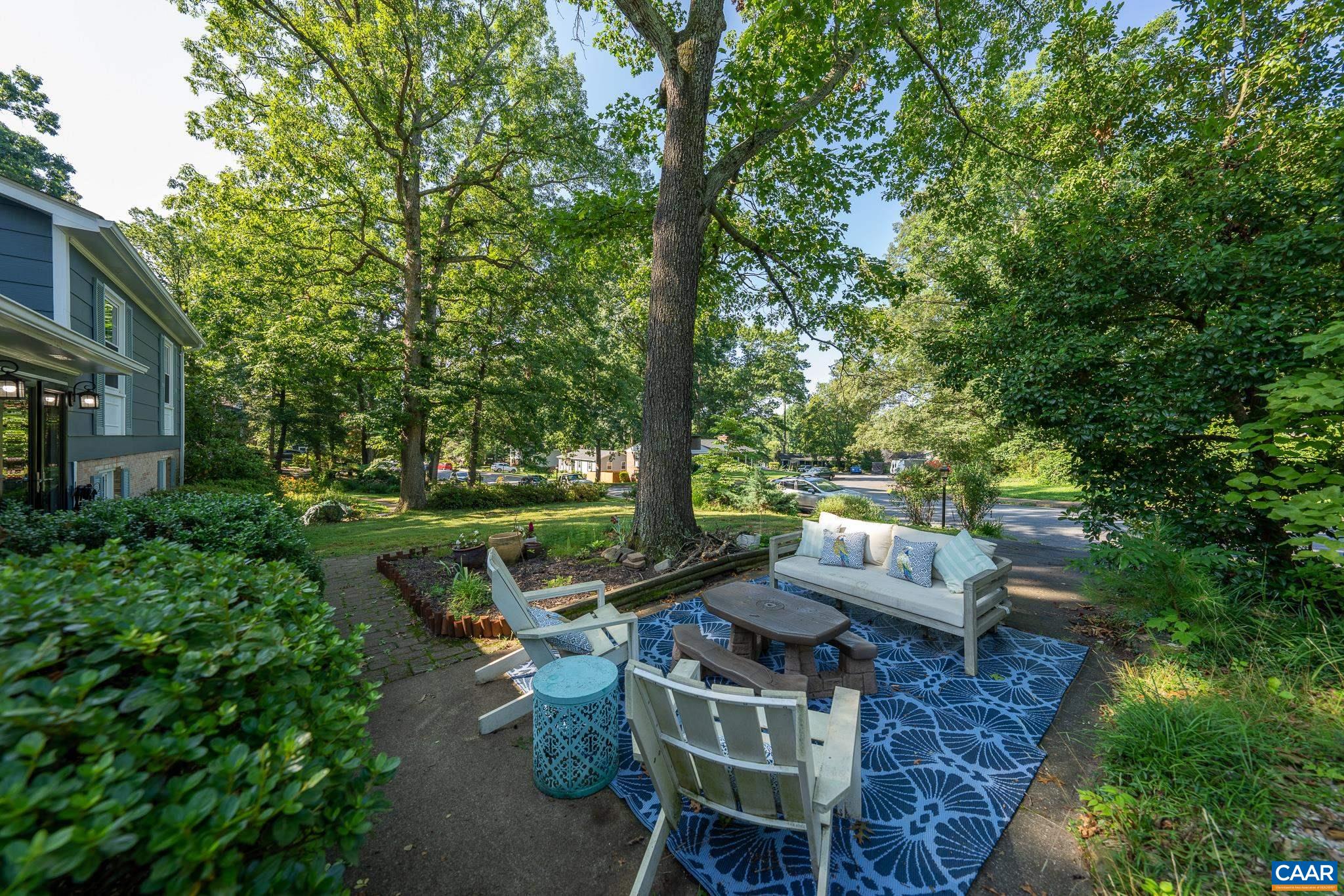 723 Village Road Charlottesville, VA 22903 - Photo 5 of 51 a view of backyard with seating space