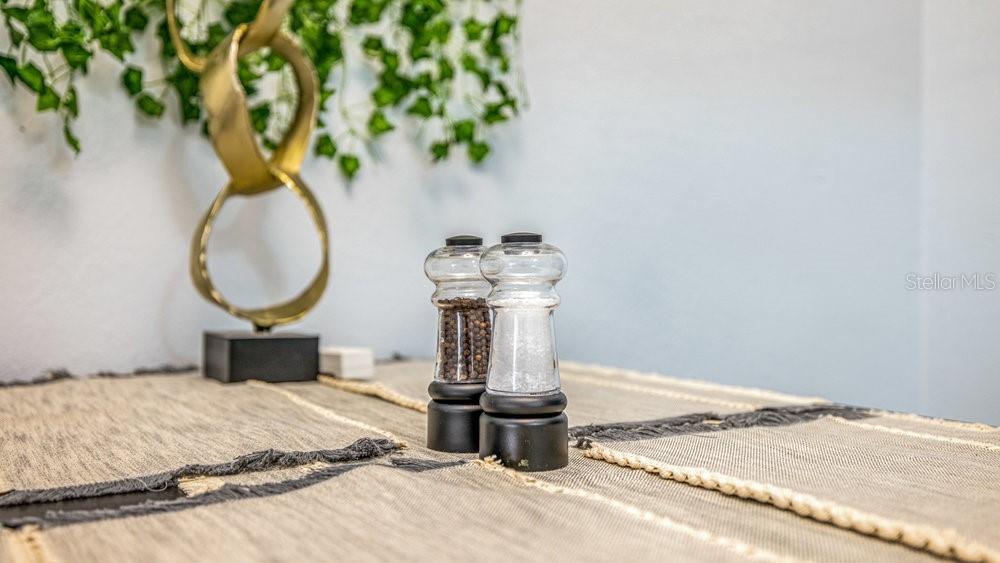 Undisclosed Address Orlando, FL 32812 - Photo 19 of 30 a room with a chandelier