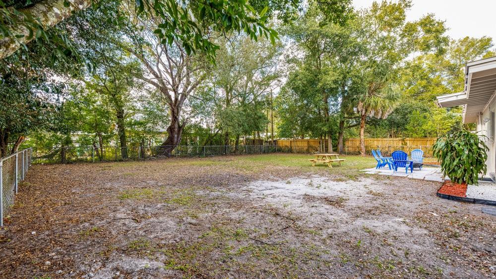 Undisclosed Address Orlando, FL 32812 - Photo 24 of 30 a view of a park with large trees