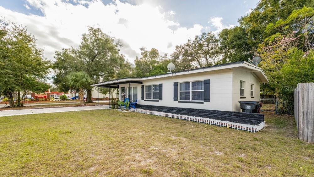Undisclosed Address Orlando, FL 32812 - Photo 3 of 30 a view of a house with pool and sitting area