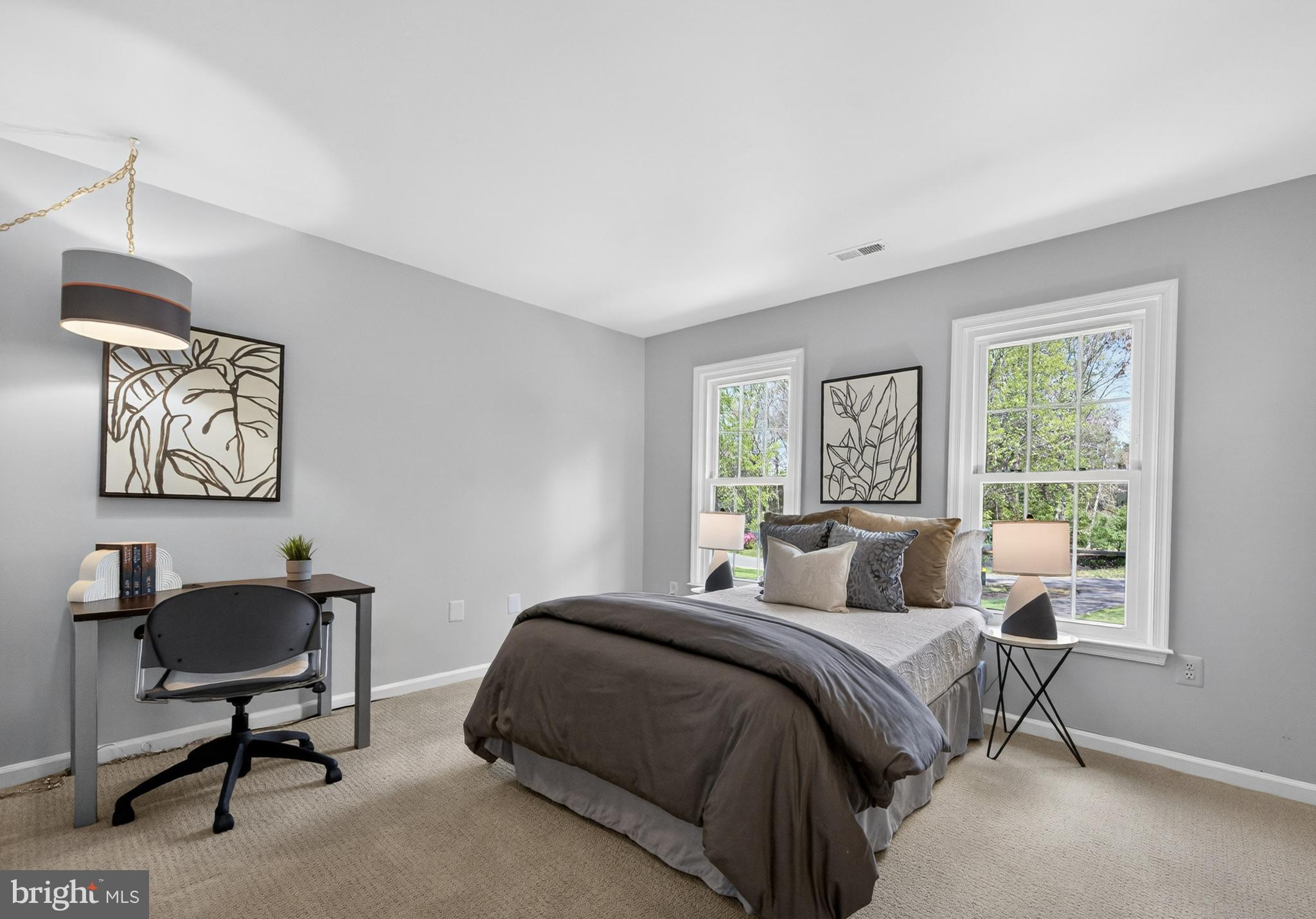 2906 Oakton Ridge Circle Oakton, VA 22124 - Photo 25 of 42 a bedroom with a bed a table and chair
