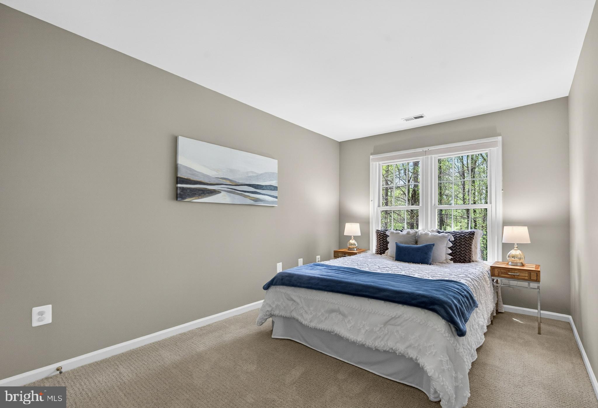 2906 Oakton Ridge Circle Oakton, VA 22124 - Photo 26 of 42 a bedroom with a bed and a window