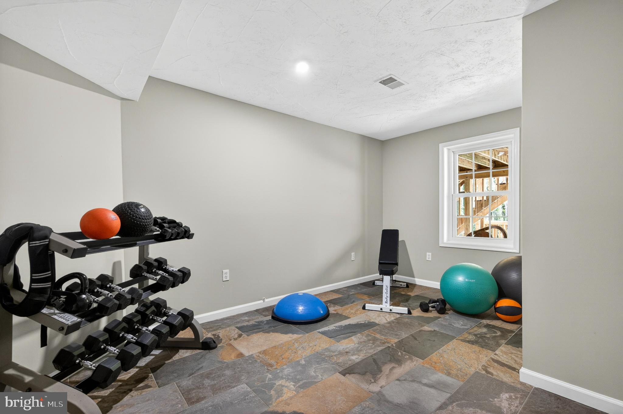 2906 Oakton Ridge Circle Oakton, VA 22124 - Photo 28 of 42 a room with gym equipment