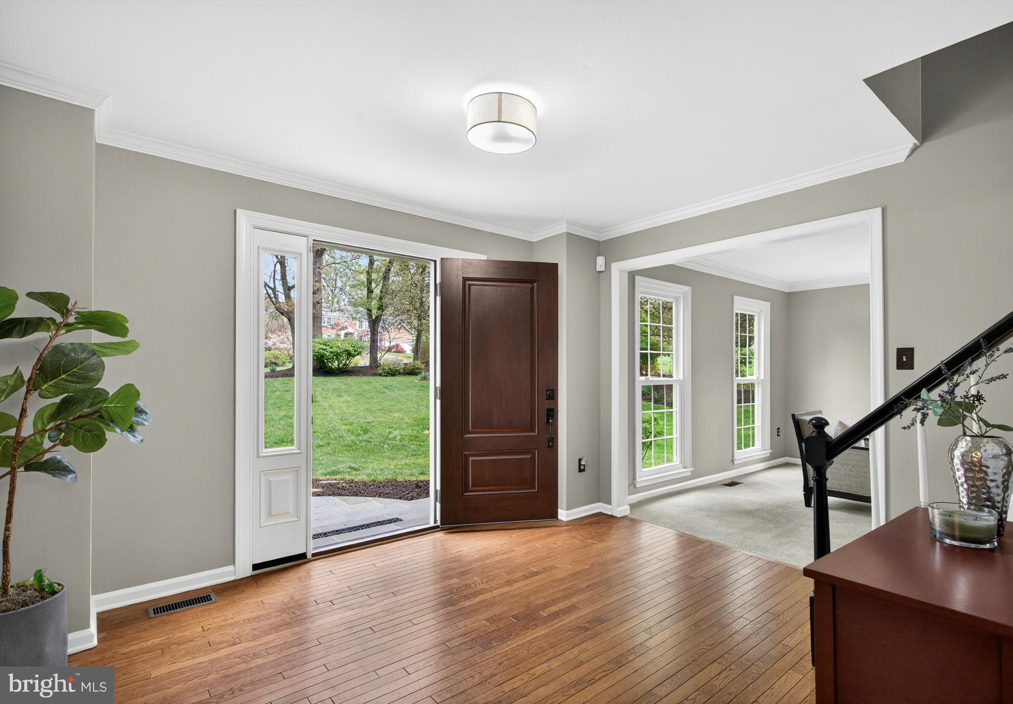 2906 Oakton Ridge Circle Oakton, VA 22124 - Photo 3 of 42 a view of an entryway with wooden floor and front door