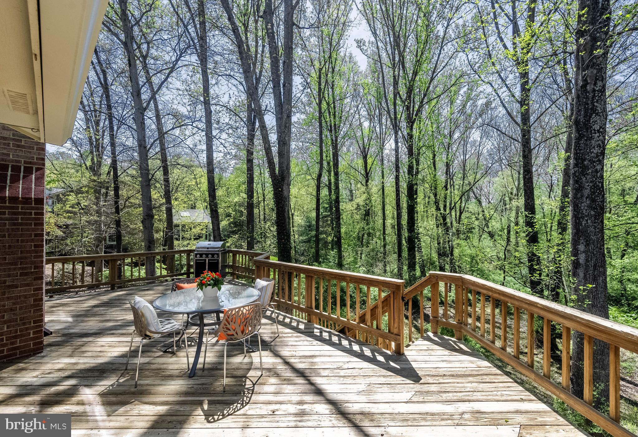 2906 Oakton Ridge Circle Oakton, VA 22124 - Photo 36 of 42 a view of a chair and tables on the deck
