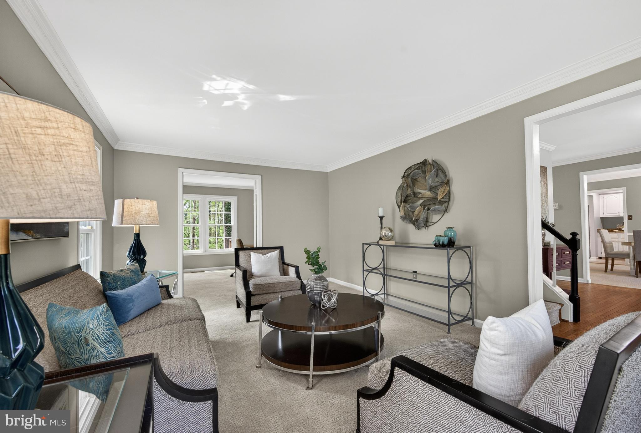 2906 Oakton Ridge Circle Oakton, VA 22124 - Photo 5 of 42 a living room with furniture and a fireplace