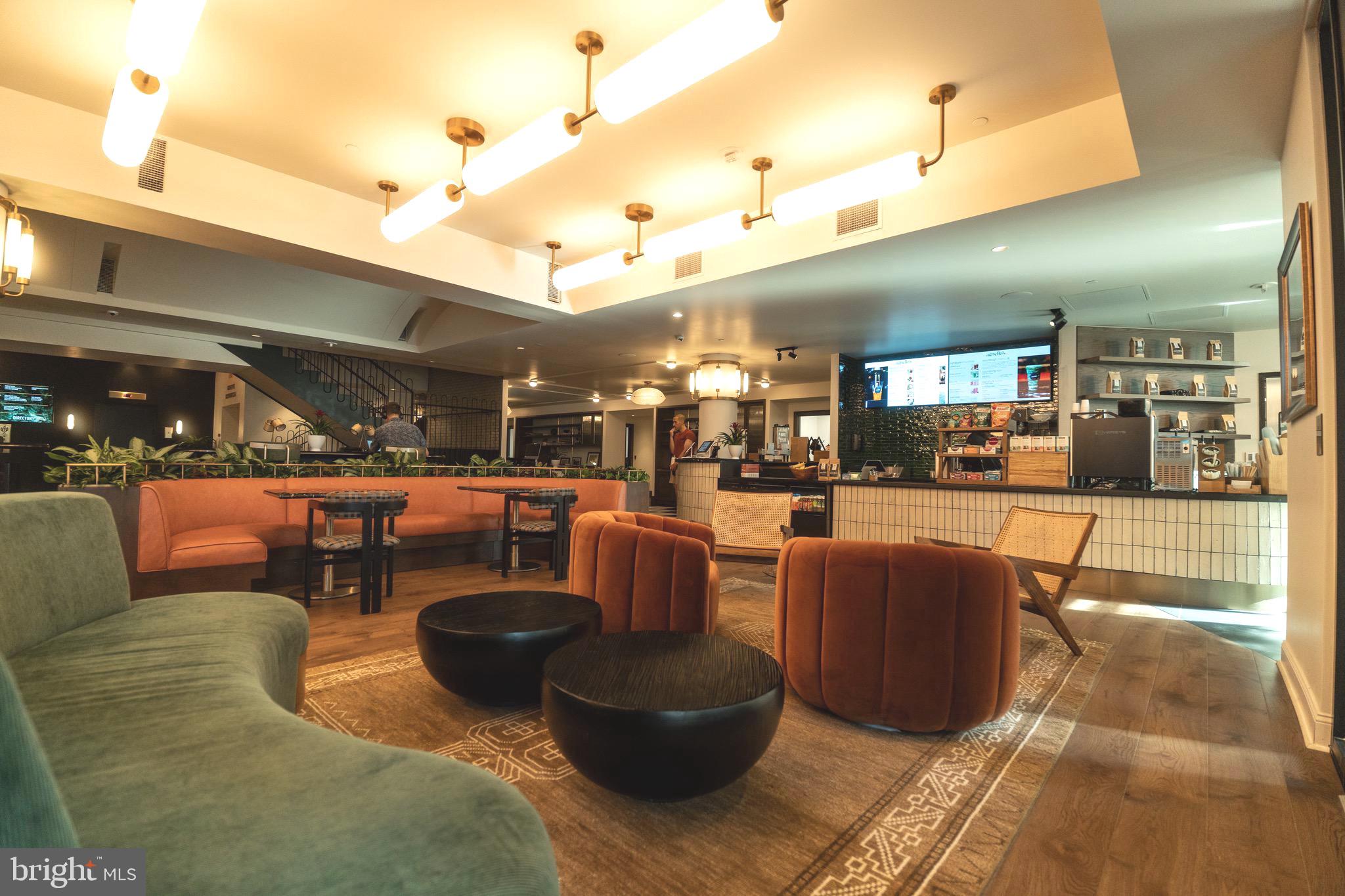 200 South Broad Street, Unit 1015 Philadelphia, PA 19102 - Photo 34 of 48 a living room with couches a coffee table and chairs