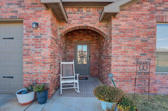 a close view of a fireplace with potted plants