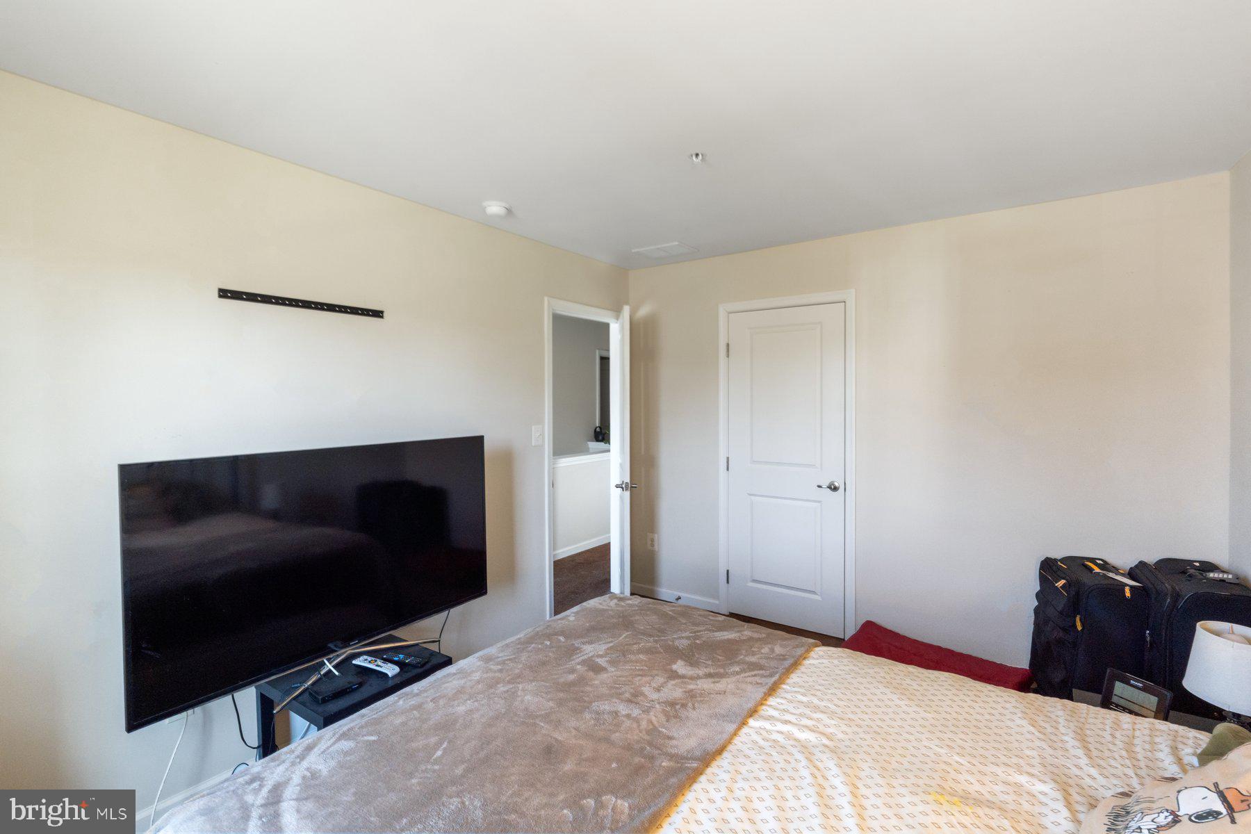 150 Cool Springs Road North East, MD 21901 - Photo 19 of 54 a bedroom with a bed and a television