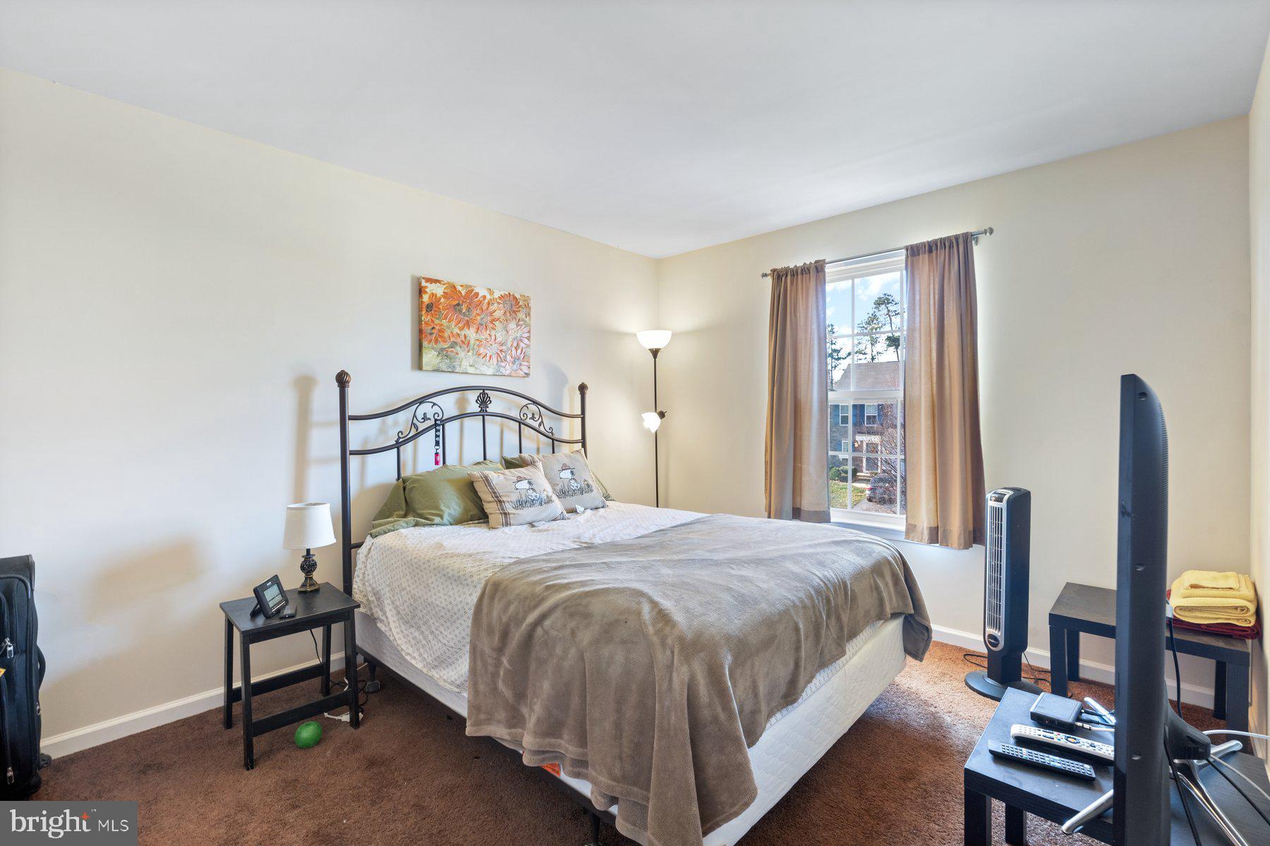 150 Cool Springs Road North East, MD 21901 - Photo 20 of 54 a bedroom with a bed table and a window