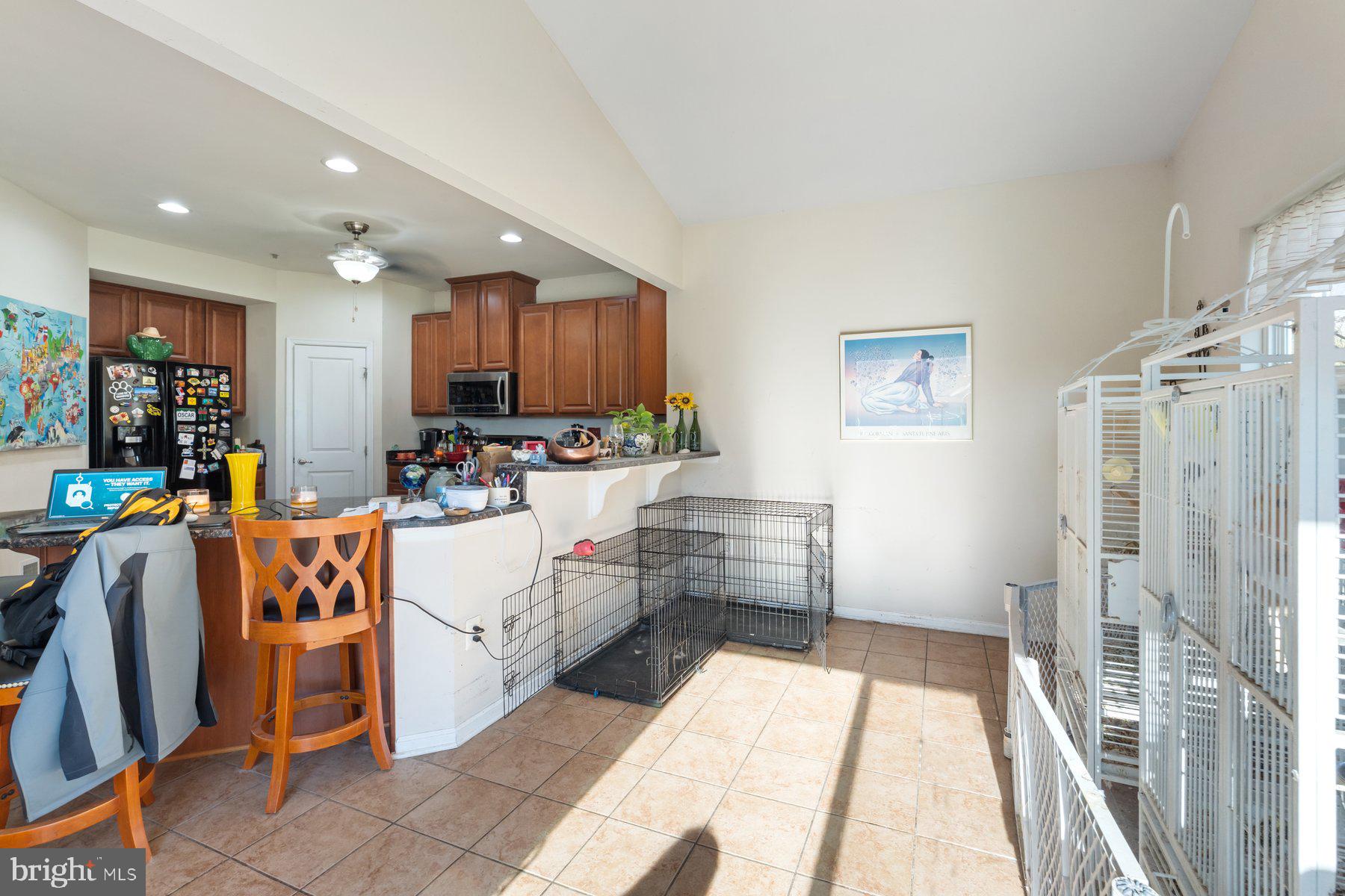 150 Cool Springs Road North East, MD 21901 - Photo 33 of 54 a living room with stainless steel appliances furniture a rug and a kitchen view