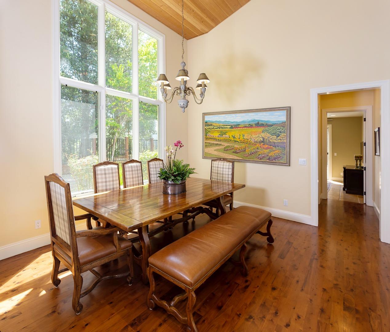 595 Day Valley Road Aptos, CA 95003 - Photo 11 of 37 a view of a dining room with furniture and wooden floor